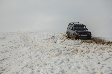 Almaty, Kazakhstan - February 21, 2013  Off-road racing on jeeps, Car competition,  ATV  Traditional race  Kaskelen gullies  Cup  the Republic of Kazakhstan trophy-raidのeditorial素材