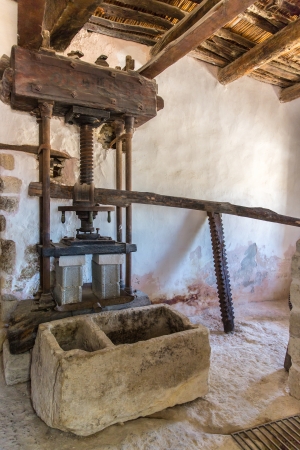 Old bathroom and toilet in Museum with artifacts of ancient Greek pottery and clay in monastery  in Messara Valley Crete, Greeceのeditorial素材