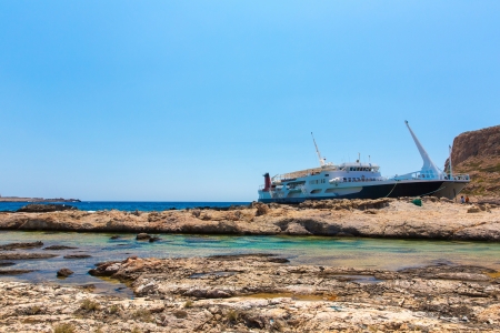 Balos beach and  Passenger Ship. View from Gramvousa Island, Crete in Greece.Magical turquoise waters, lagoons, beaches of pure white sand.の写真素材