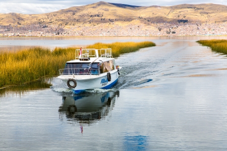 Lake Titicaca,South America, located on border of Peru and Bolivia. It sits 3,812 m above sea level, making it one of the highest commercially navigable lakes in the world.のeditorial素材