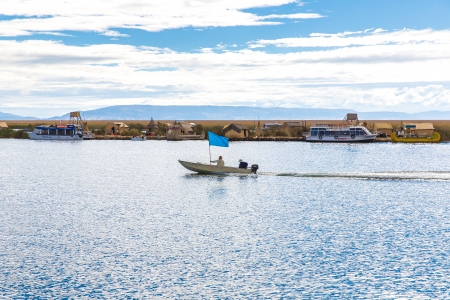 Traditional reed boat lake Titicaca,Peru,Puno,Uros,South America,Floating  Islands,natural layer about one to two meters thick that support islandsのeditorial素材