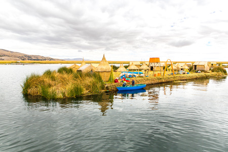 Traditional reed boat lake Titicaca,Peru,Puno,Uros,South America,Floating  Islands,natural layer about one to two meters thick that support islandsのeditorial素材