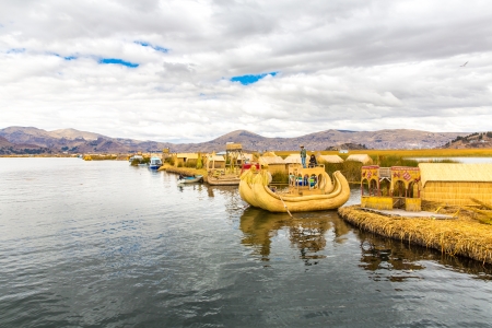 Traditional reed boat lake Titicaca,Peru,Puno,Uros,South America,Floating  Islands,natural layer about one to two meters thick that support islandsの写真素材