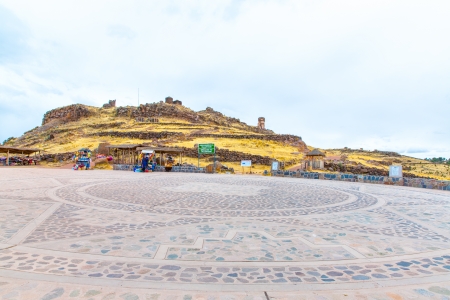 Souvenir market near towers in Sillustani, Peru,South America. Street shop with colorful blanket, scarf, cloth, ponchos,ornaments,のeditorial素材