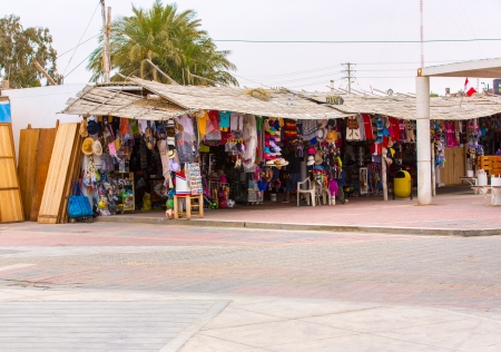 Market on Road Cusco-Puno near Lake Titicaca, Peru, South America. Colorful blanket, cap, scarf, cloth, ponchos from  wool of alpaca, llamaのeditorial素材