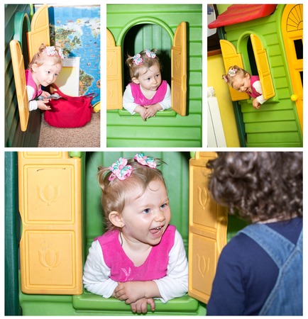 Little child girl playing in kindergarten in Montessori preschool Class.の写真素材