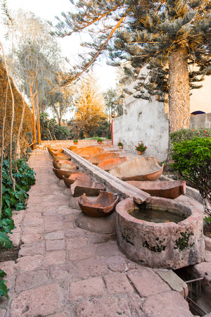 Altar and icons in old church in Arequipa, Peru, South America. Arequipa's Plaza de Armas is one of the most beautiful in Peru.の写真素材