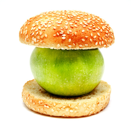 apple in humburger isolated on whiteの写真素材
