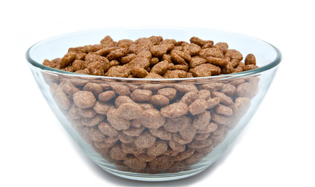 Chocolate cereal in the bowl isolated on white backgroundの写真素材