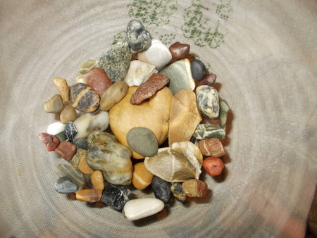 Colored stones in glass jars