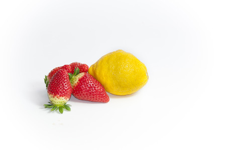 stil life of organic strawberries and lemon all cutの写真素材
