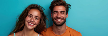 Radiant Smiling Couple on Blue Backgroundの素材