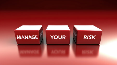 Three red cubes with white text, Manage Your Risk, on a red background.の素材
