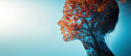 A silhouette of a woman is artfully merged with autumn leaves, showing nature's beauty and tranquility.の素材