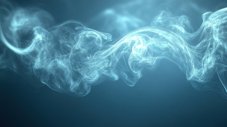 Wisps of soft blue smoke curl and flow gently, creating a serene atmosphere in a dark space.の素材