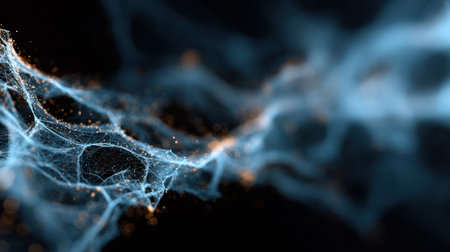 Delicate glowing fibers in blue and gold intertwine creating an ethereal effect in the darkness.の素材