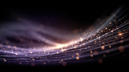 Colorful light waves flow smoothly against a dark backdrop creating a mesmerizing visual effect.の素材