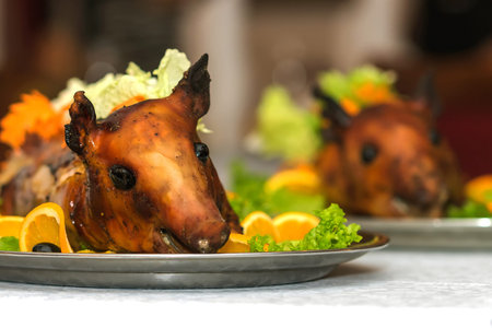 Roasted pig on a plate in a restaurant