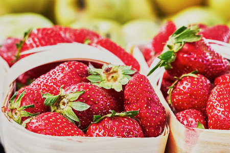 Strawberry in a basket on the marketの写真素材