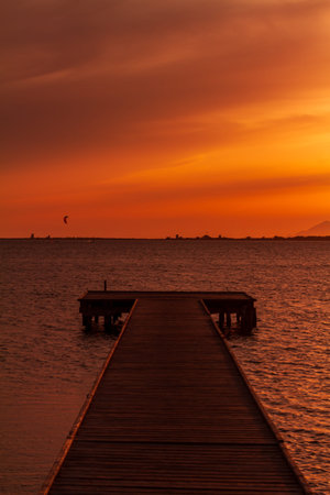 The picture has been taken during summer from a pier in the Stagnone, a low sea water area located...
