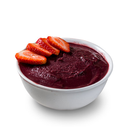 Brazilian frozen aÃ§ai berry ice cream bowl with strawberry. isolated on a white background. Summer menu front view.の写真素材