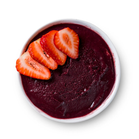 Brazilian frozen aÃ§ai berry ice cream bowl with strawberry. isolated on a white background. Summer menu top view.の写真素材
