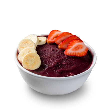 Brazilian frozen aÃ§ai berry ice cream bowl with strawberries and bananas. isolated on a white background. Summer menu front view.の写真素材