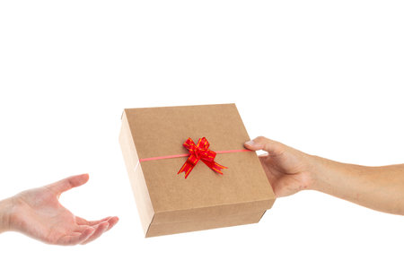 man giving a gift from valentines day to his girlfriend.の写真素材