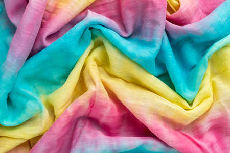 Crumpled linen cloth texture. Wrinkled textile. colorful tie dye.の写真素材