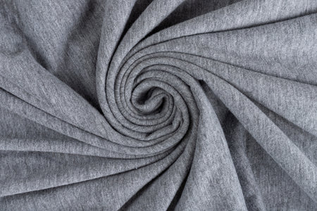 Crumpled linen cloth texture. Wrinkled textile. Gray.の写真素材