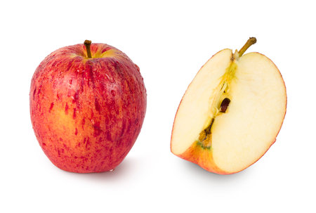Apple and slice separated isolated on white background.の写真素材