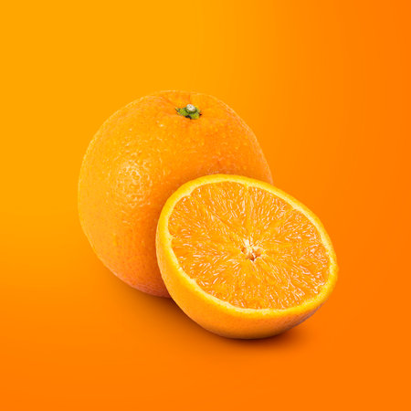 Orange and slice Fruit Isolated on Orange Background.の写真素材