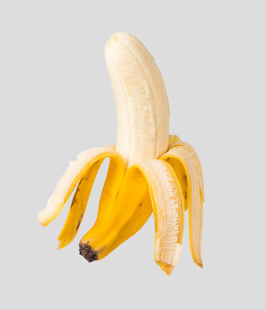 Peeled Banana on white background.の写真素材