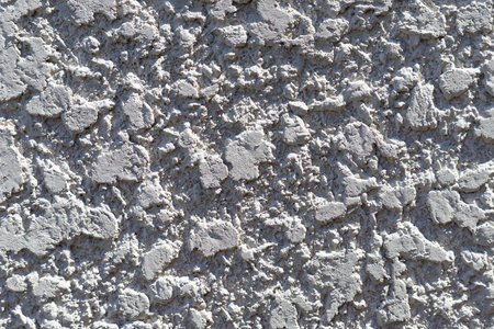Speckled Rough Cement Textured Gray wall.の写真素材