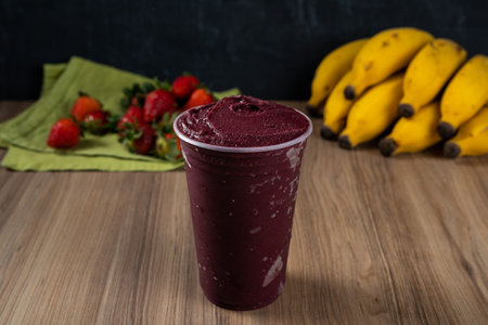 Brazilian Frozen Acai Berry. With fruits on background.の写真素材