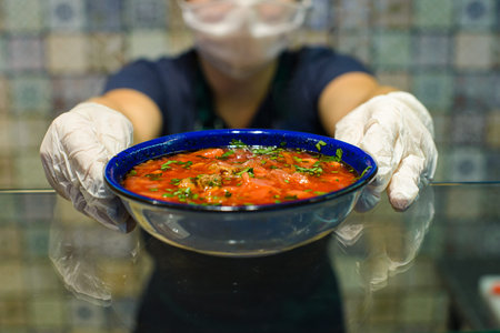 dish of tomato soup ready to order in canteen