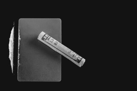 Cocaine, plastic card and dollar bill.の写真素材