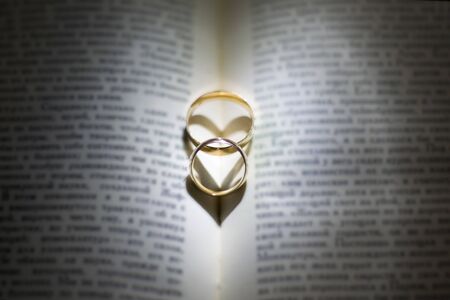 Wedding rings in the book.の写真素材