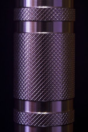 Steel pipe close-up on a black backgroundの写真素材