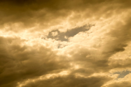 Blurry background of dramatic colorful sky. Burning clouds at sunset sunrise view. Cloud pattern...