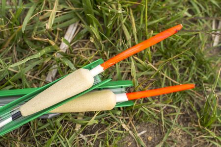 Fishing floats. Preparation for fishing. Rest on the river in the summer.の写真素材