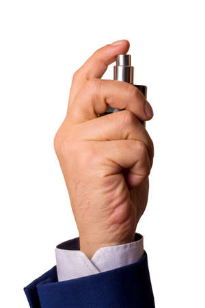 Man's hand holds a bottle of perfume. Isolateの写真素材