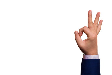 Male hand shows ok sign on white background.Isolated image.Copy space