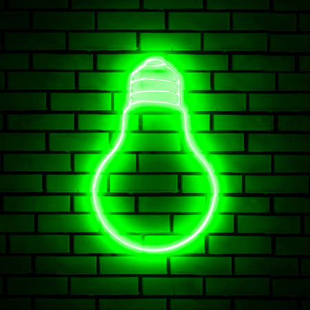Neon light bulb sign on brick wallの写真素材