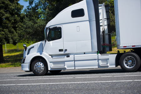 Profile of rapid modern powerful semi truck の写真素材