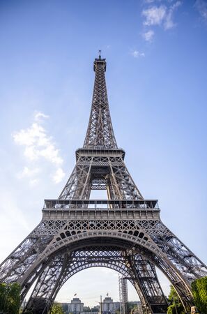 The unique iconic famous Eiffel Tower, as a symbol and main landmark of Paris and the French inventive genius in the historical past, attracts thousands of tourists with its design and uniquenessの写真素材