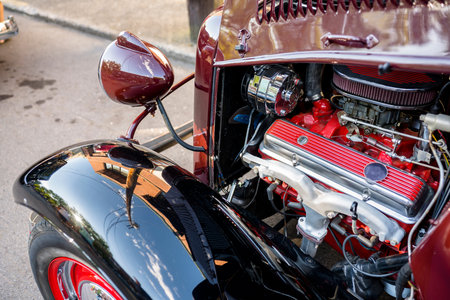 Elegant stylish black old vintage retro car with large convex wings and headlights and open powerful...