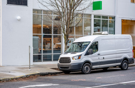 Compact commercial cargo mini van for delivery and small business services with rooftop air...