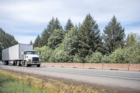 White day cab big rig industrial semi truck tractor for local deliveries transporting commercial...