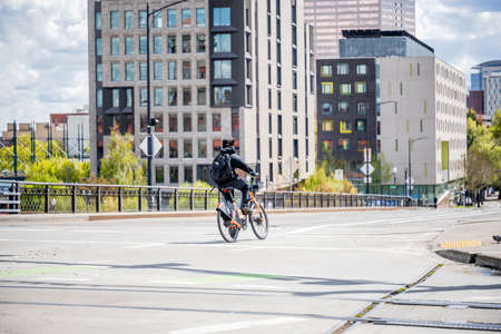 Cycling for a man in old age is useful and necessary for health, cycling trips and sports cycling helps maintain vitality, testosterone production, blood flow, strengthen muscles, eliminate stressの写真素材
